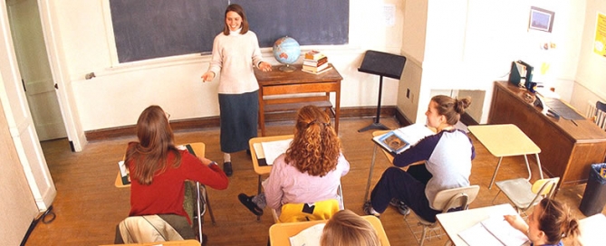 A teacher teaching students in a classroom