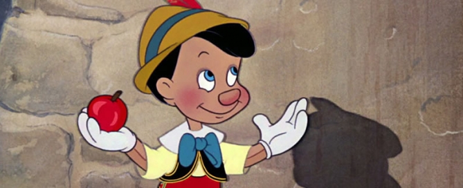 An image of Pinocchio holding a red apple